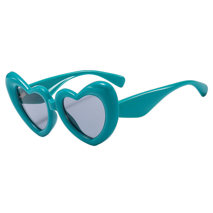 Dame Hjerteformet Solbrille med stilfull innramming Skanto
