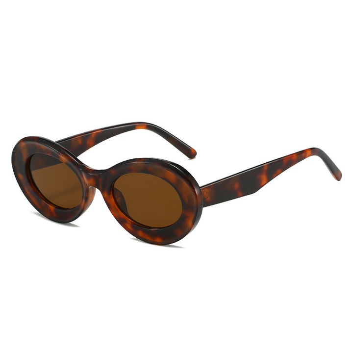 Dame moteriktig solbrille i oval design Skanto