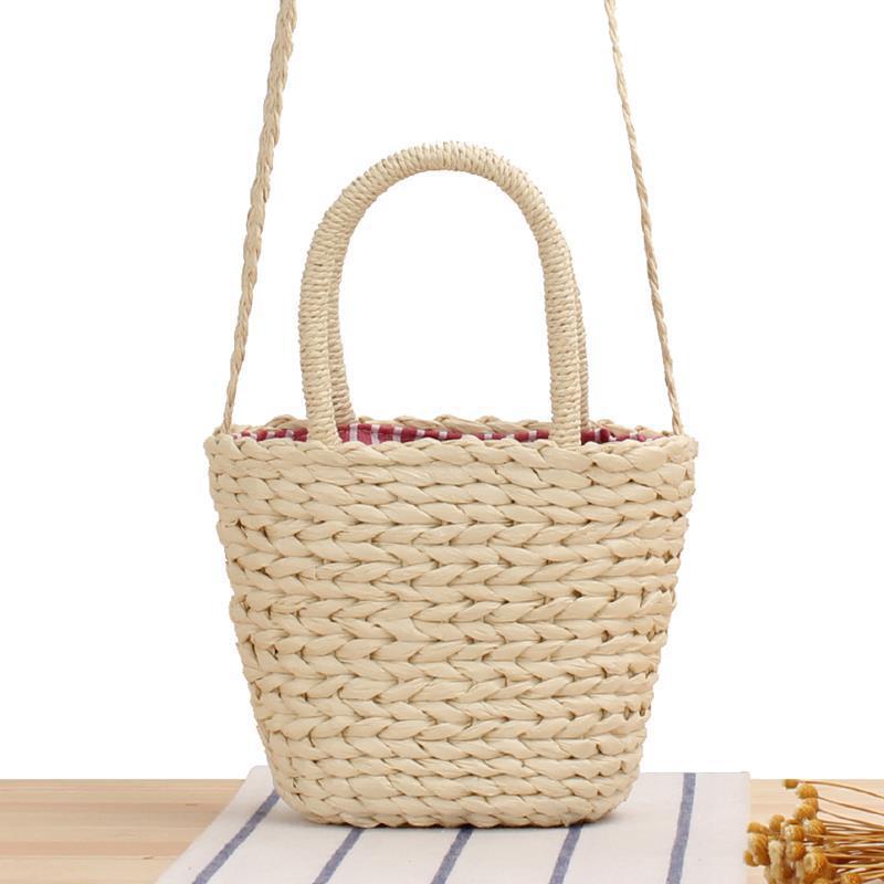 Umhengerbag av flettet naturmateriale Skanto