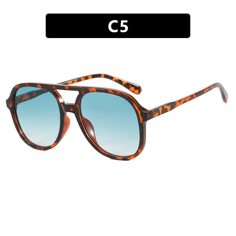 Dame solbrille med elegant skilpaddemønster og UV-beskyttelse Skanto