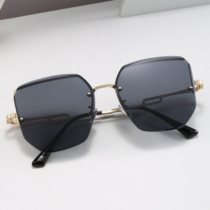 Dame geometrisk designer-solbrille med speilende linser Skanto