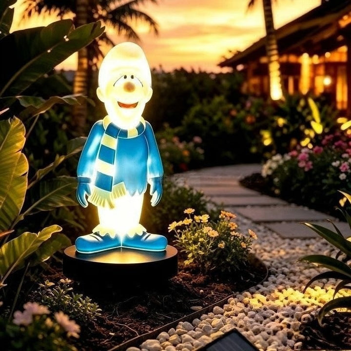 Solar-powered cartoon flame figure garden stake light with acrylic diffuser and adjustable ground spike Skanto