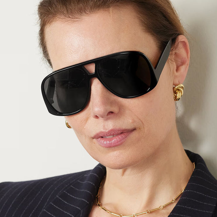 Dame moted sport-solbrille med robust ramme og UV-beskyttelse Skanto