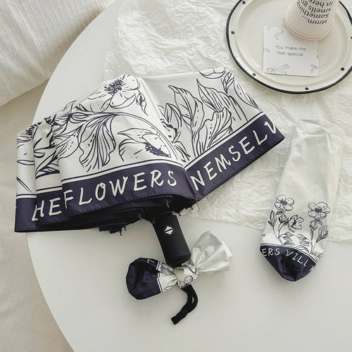 Dame sammenleggbart paraply med kreativt kunstdesign Skanto