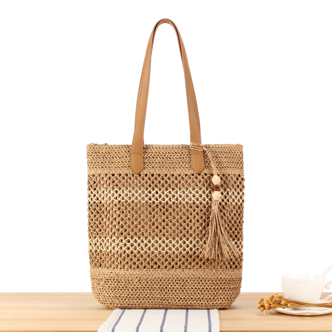 Handbag made of natural woven material with elegant leather straps Skanto