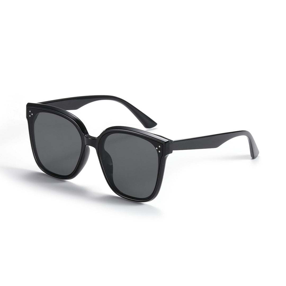 Dame moteriktig solbrille med gjennomsiktig aksent Skanto