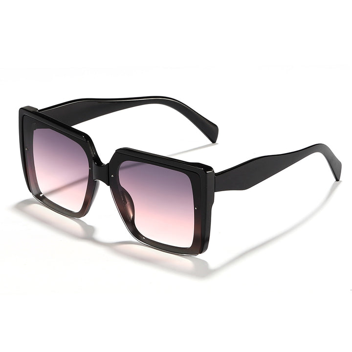 Dame oversized solbrille i trendy kvadratdesign Skanto