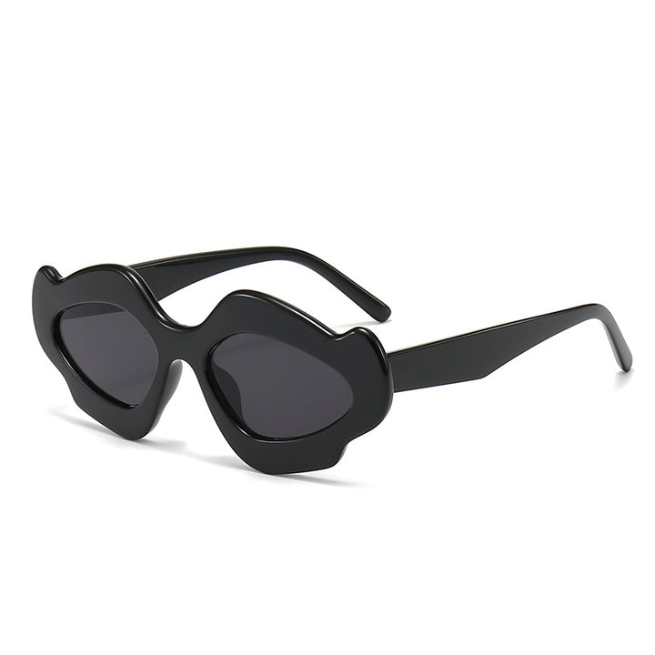 Dame moteriktig solbrille med unik blomsterramme Skanto