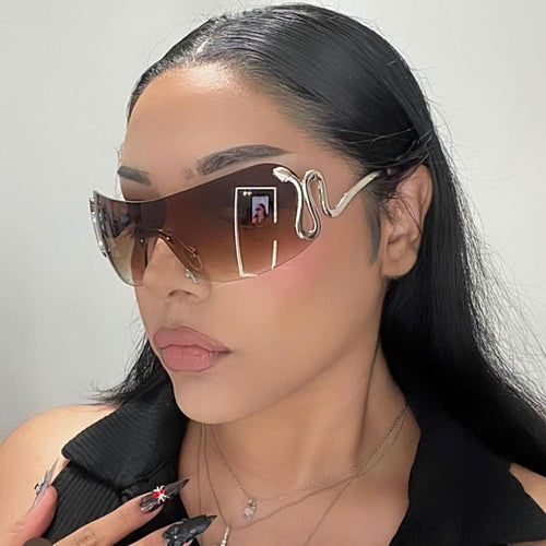 Damer futuristisk sportssolbrille med lekent design Skanto