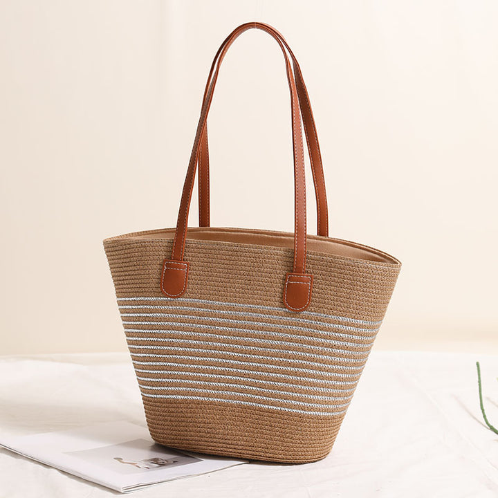 Elegant Bastbag med skinnaksenter Skanto