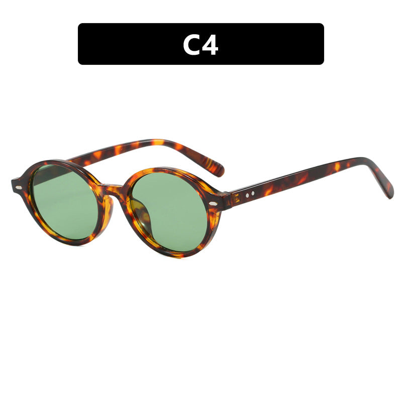 Dame rund solbrille med moderne design og polariserte glass Skanto