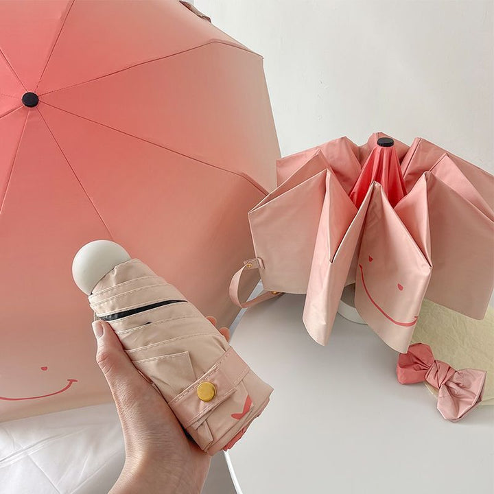 Dame foldbare paraply med leken design og praktisk treskaft Skanto