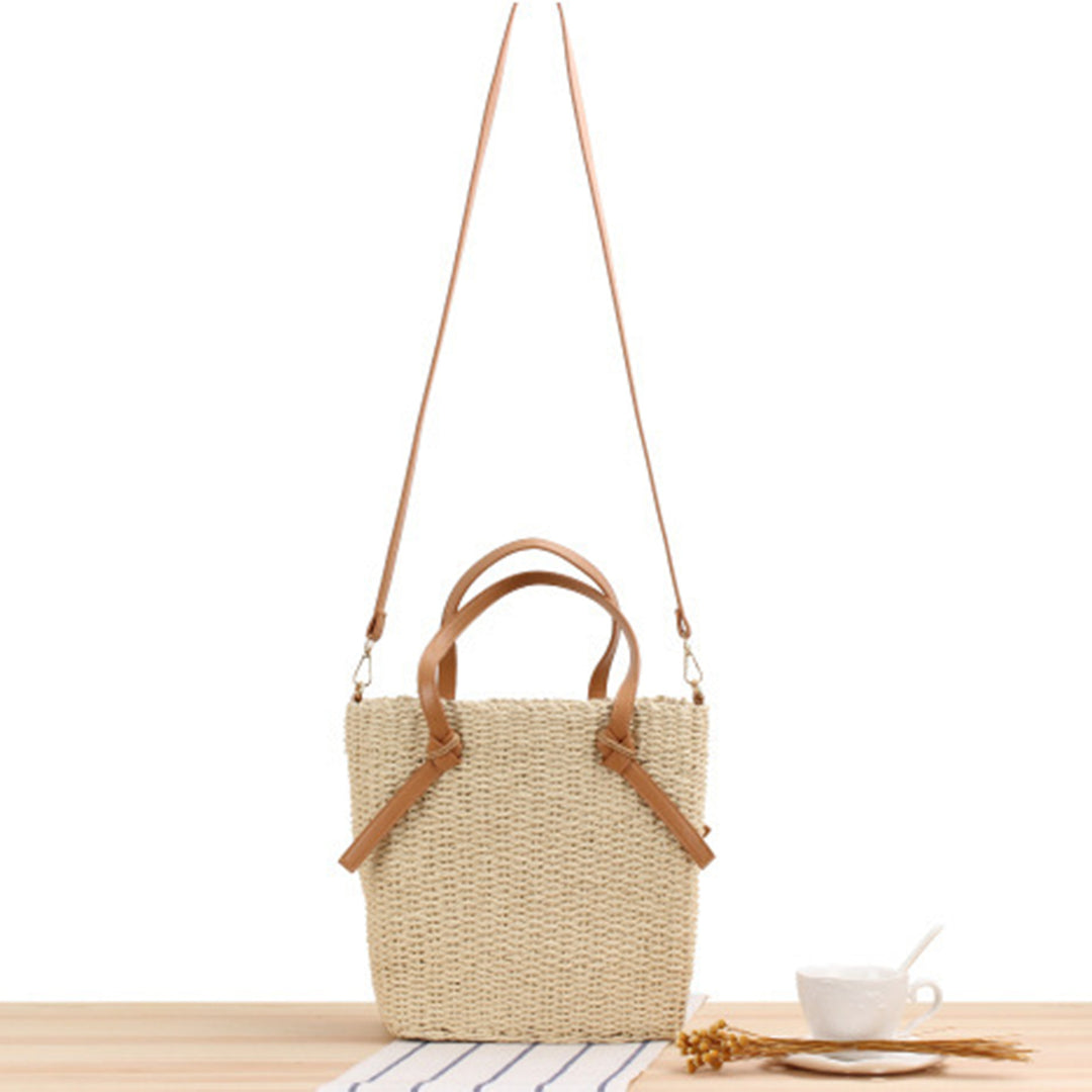Woven natural material handbag with detachable leather handles Skanto