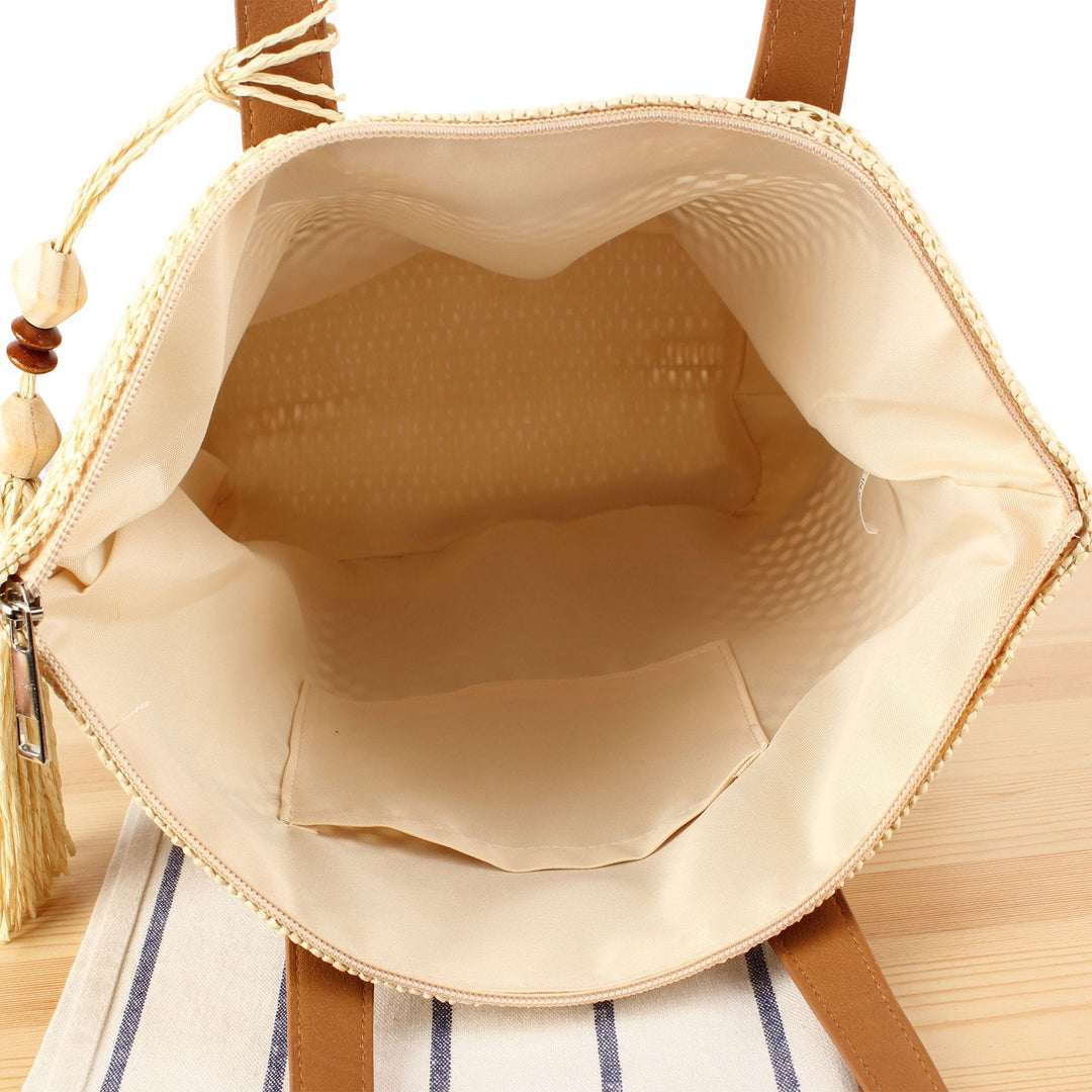 Handbag made of natural woven material with elegant leather straps Skanto
