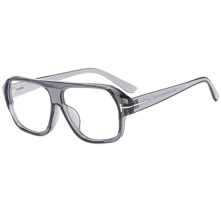Dame modische solbrille med markant geometri og brune glass Skanto