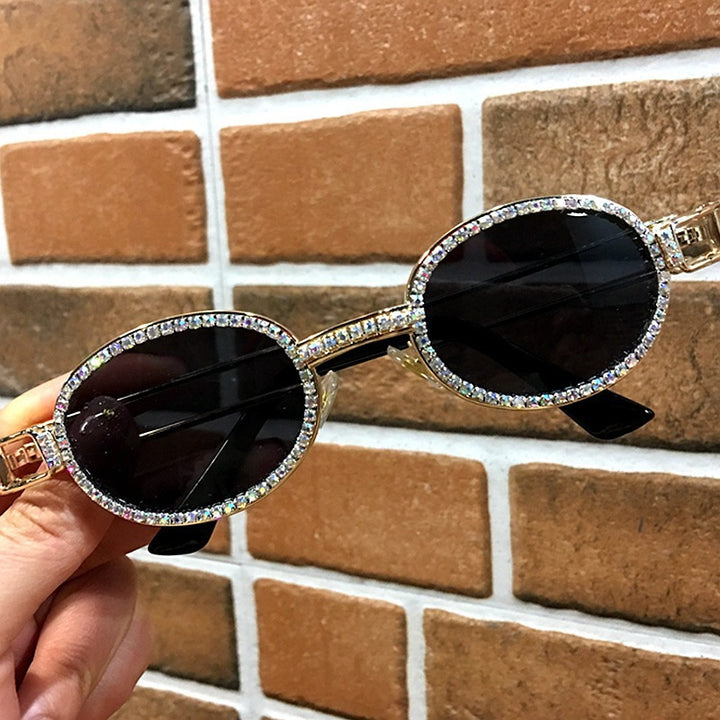 Dame feminin Designer-solbrille med ekstravagant ramme Skanto