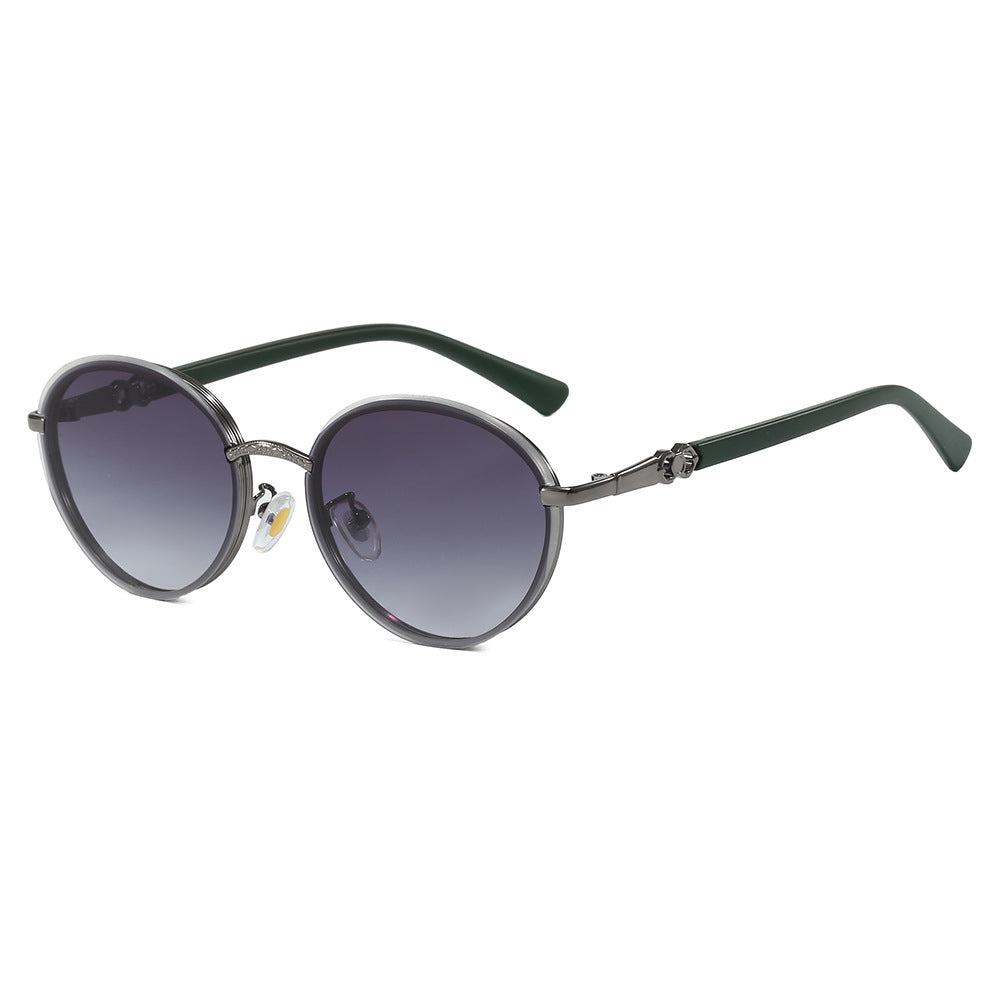 Dame elegant rund solbrille med speilende effekt Skanto