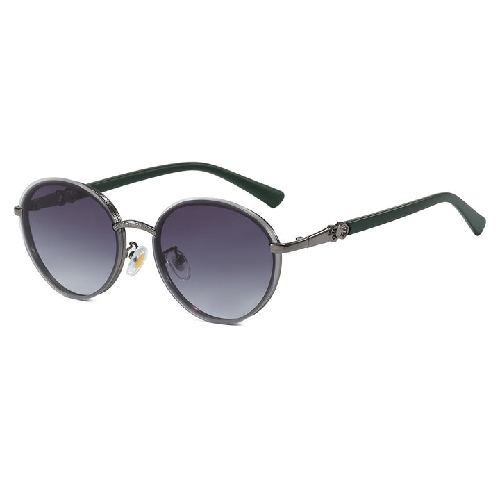 Dame elegant rund solbrille med speilende effekt Skanto