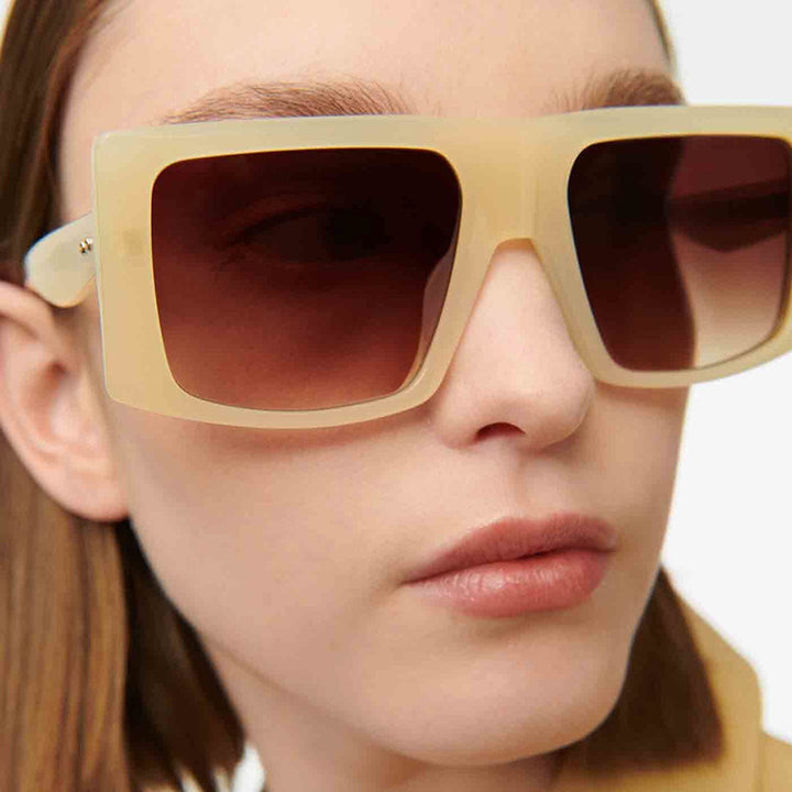 Dame kvadratisk solbrille med robust plastinnfatning og beskyttende UV-filter Skanto