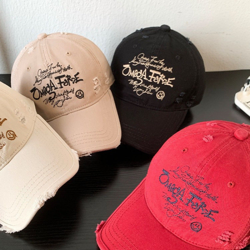 Kvinnenes slitte grafiske justerbare baseballcaps Skanto