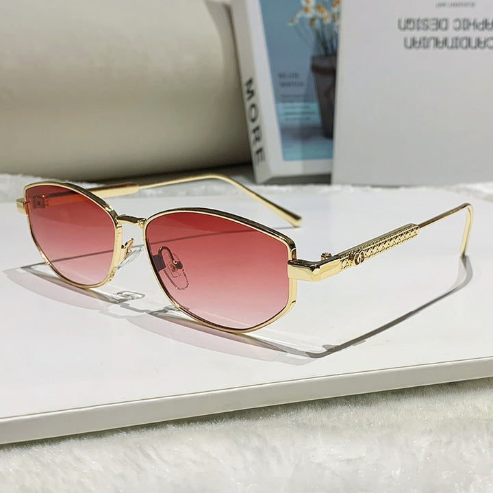 Dame elegant solbrille med glitrende metallramme Skanto