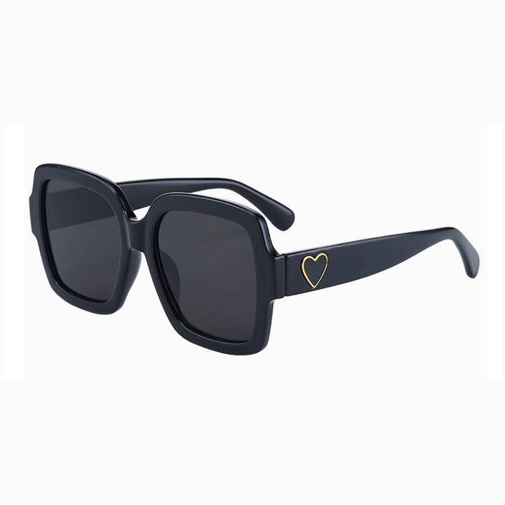 Dame Modemessig solbrille med eksklusiv hjerte-detalj Skanto