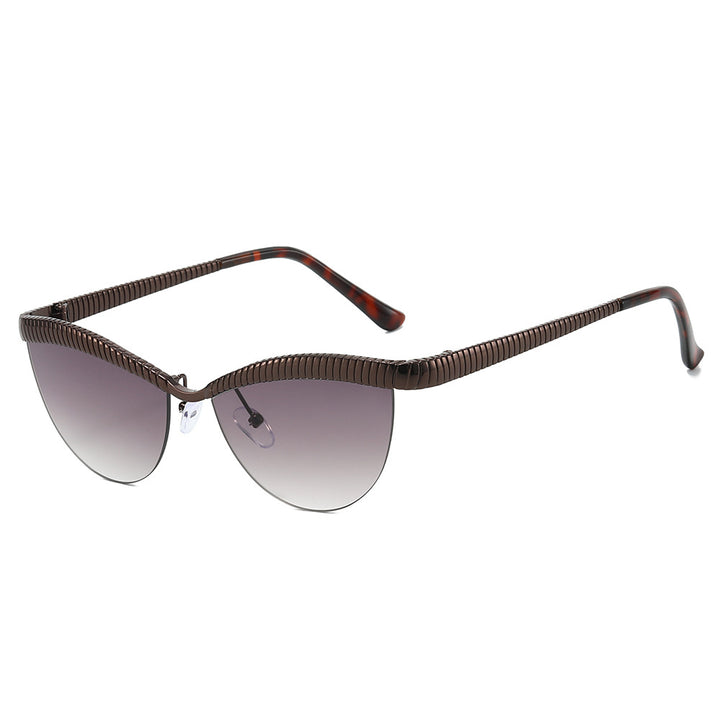 Dame Designer solbrille med unikt, bølget ramme Skanto