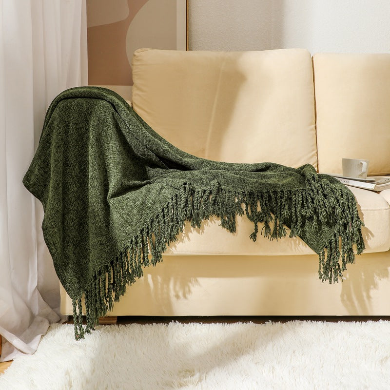 Kvinnelig elegant og stilfull sofa teppe med frynser Skanto