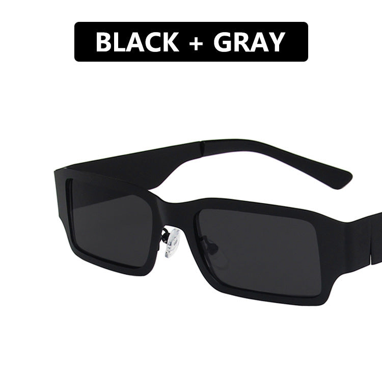 Dame geometrisk solbrille med beskyttende UV-filter og robust metallramme Skanto