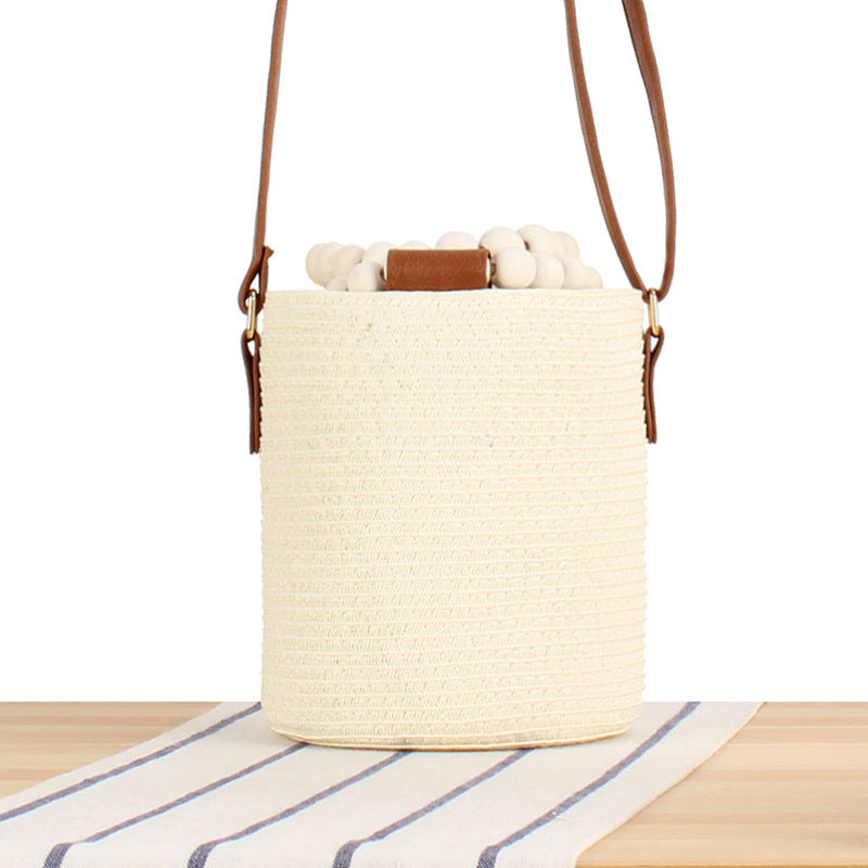 Handbag made of high-quality woven natural material with innovative lock Skanto