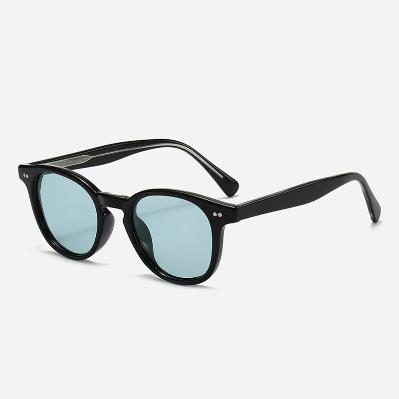 Dame Rund solbrille med stilfullt mønster og UV-beskyttelse Skanto