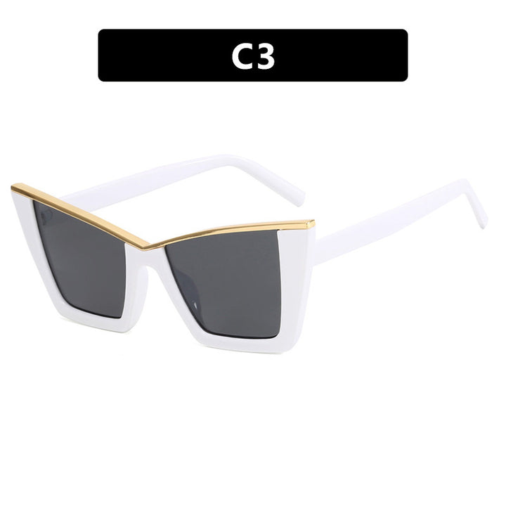 Dame moteriktig solbrille med unik geometrisk ramme Skanto