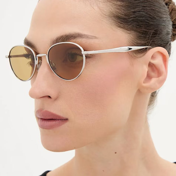 Dame runde solbriller med elegant metallramme og UV-beskyttelse Skanto