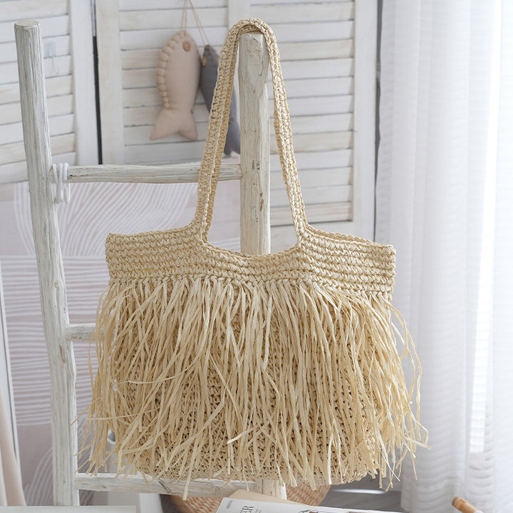 Håndlaget strandveske med fransete design Skanto