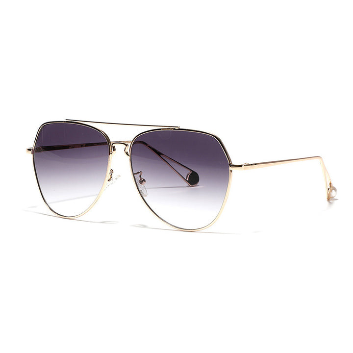 Dame aviator solbriller med polariserte linser og elegant metallramme Skanto