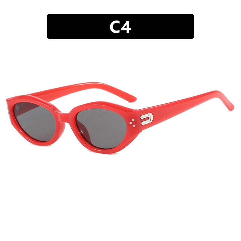 Dame Cat-Eye solbrille med aksentuerte transparente ramme og UV-beskyttelse Skanto