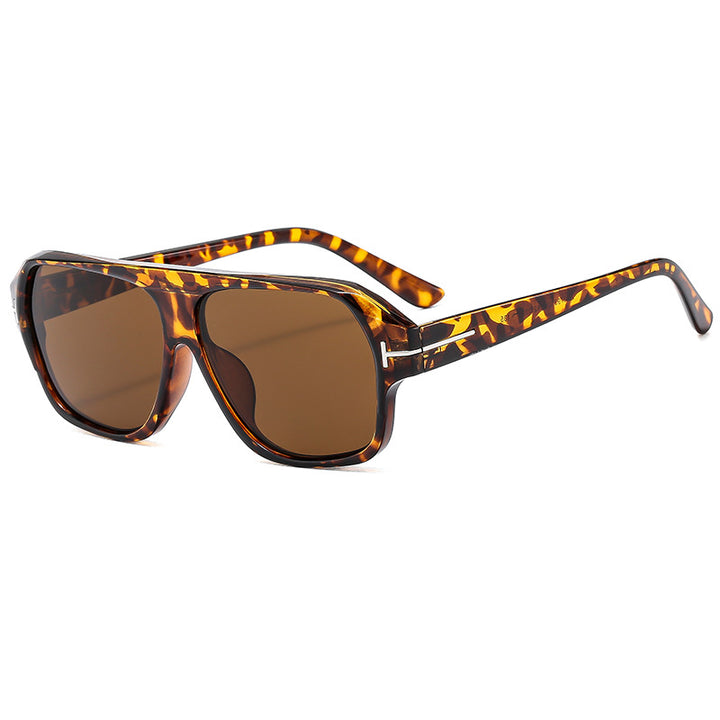 Dame modische solbrille med markant geometri og brune glass Skanto