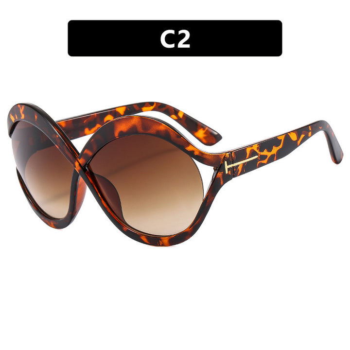 Dame ekstravagant formet solbrille Skanto