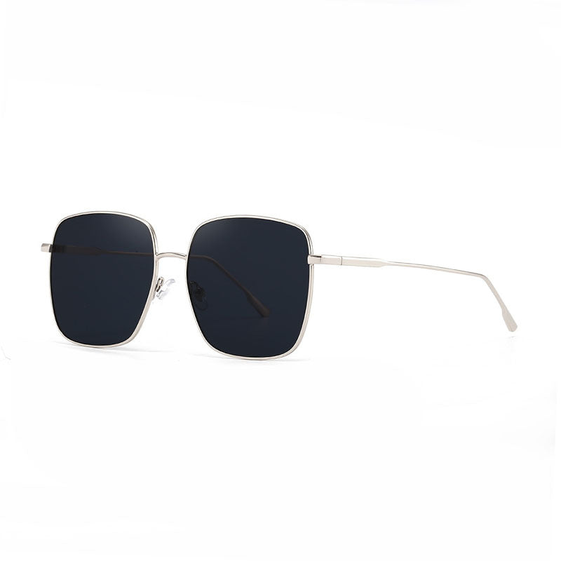 Dame solbrille med moderne firkantet rustfritt stålramme og polarisert glass Skanto