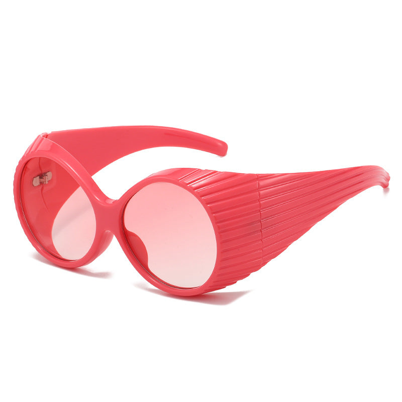 Dame Ekstravagant Solbrille med unikt bølgedesign Skanto