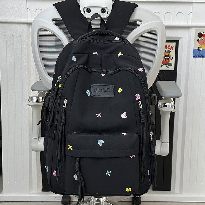 Nydelig brodert trendy skoleveske