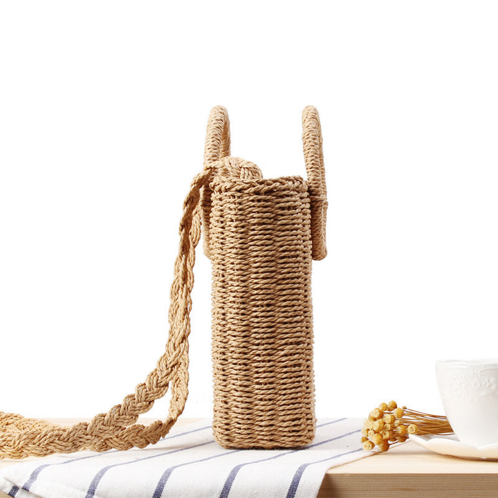 Woven natural material handbag with round handle Skanto