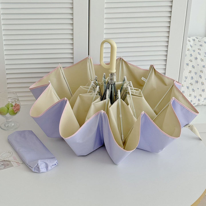 Damer Sammenleggbart paraply med innovativ blomsterform Skanto