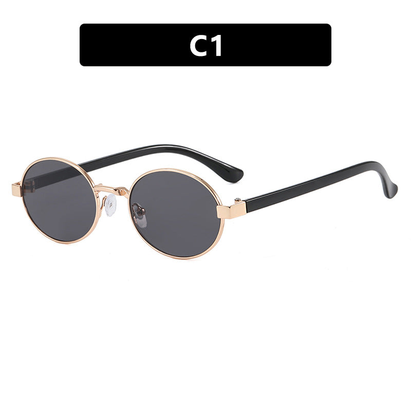 Dame rund brille med elegant metallramme og justerbare nesepads Skanto