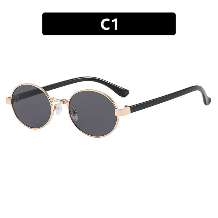Dame rund brille med elegant metallramme og justerbare nesepads Skanto