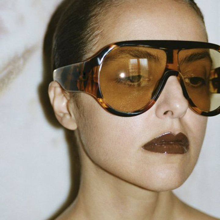 Dame oversized sports solbrille i retro-inspirert design Skanto