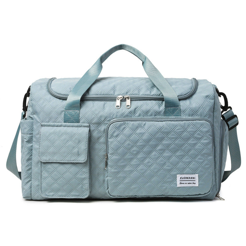 Romslig sports-duffelbag med strukturert overflate Skanto