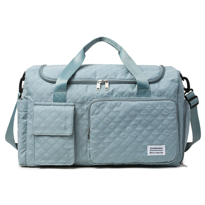 Romslig sports-duffelbag med strukturert overflate Skanto