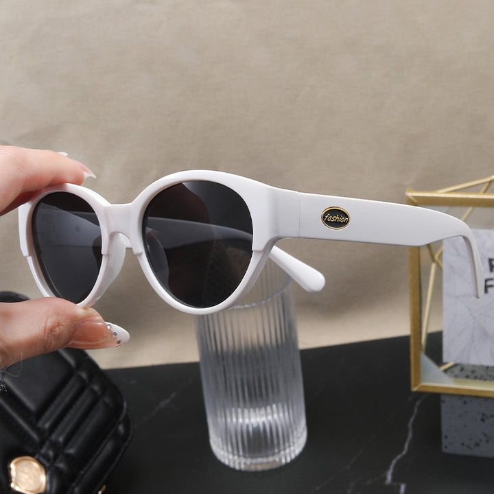 Dame Cat-Eye solbriller med eksotisk design og robust ramme Skanto