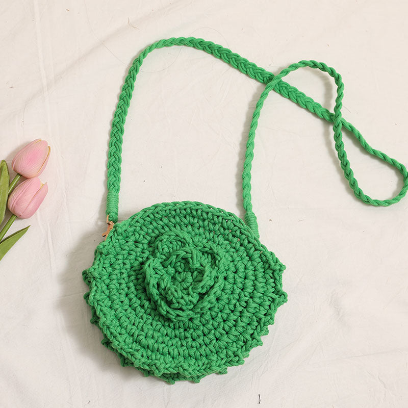 Håndheklede crossover-veske med florale detaljer Skanto